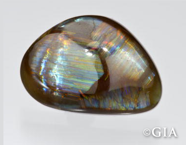 16.02-carat, cabochon shaped Andradite Garnet.