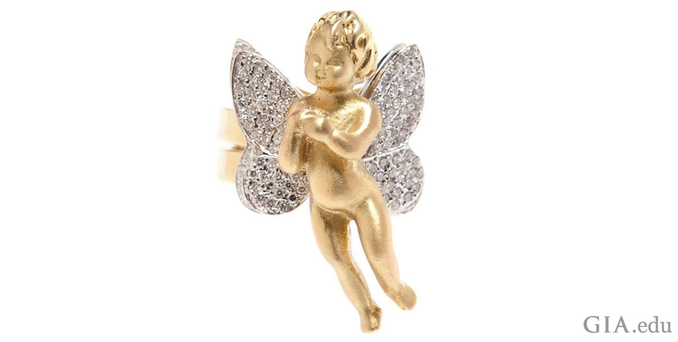 Cupid is the adorable child in this 18K gold ring with wings studded with 1.90 carats of diamonds.