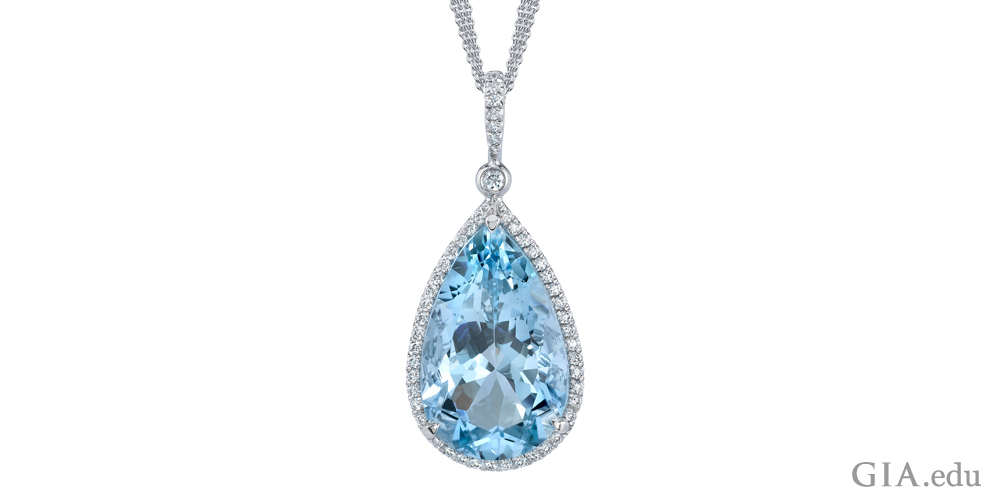 10.06 ct pear shaped aquamarine is surrounded by 72 round diamonds (0.35 carats) that are set in platinum.