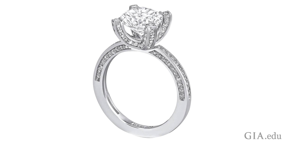 1 carat diamond engagement ring with diamonds set in the prongs and shank.