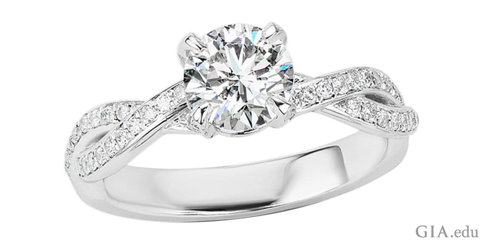 A 1.01 ct round brilliant cut diamond engagement ring.