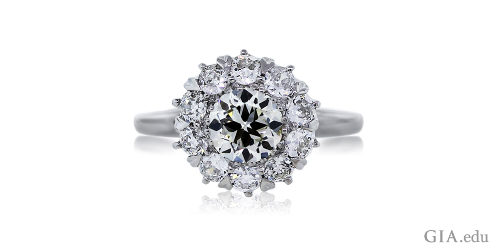 A 1.01 ct old European cut diamond with a halo of 0.91 carats of diamonds.